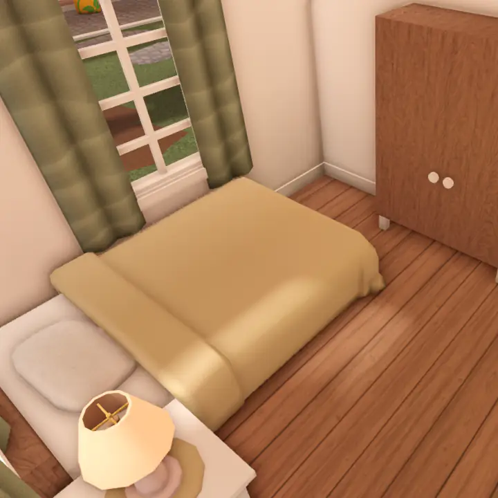 Small Bedroom with a twin bed and wardrobe.