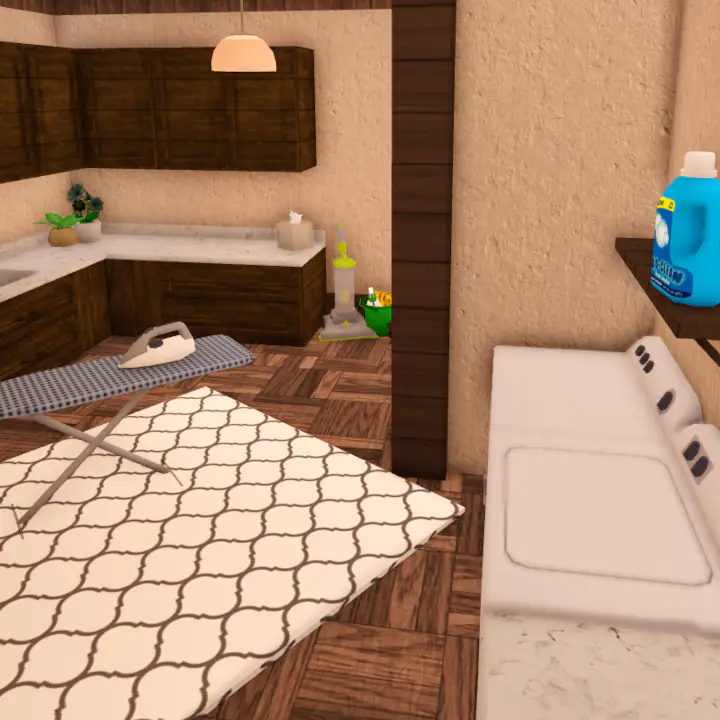 Spacious laundry room featuring storage washer and dryer along with a sink