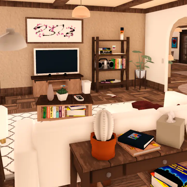 Large rustic living room featuring two couches and a tv